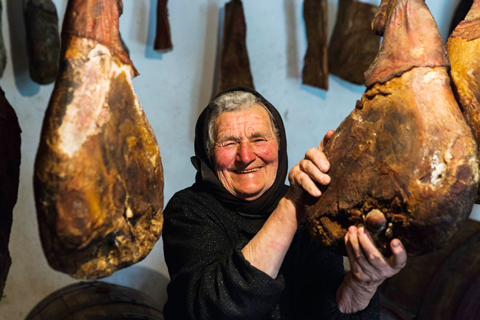 croatian women checking her charcuterie in croatia