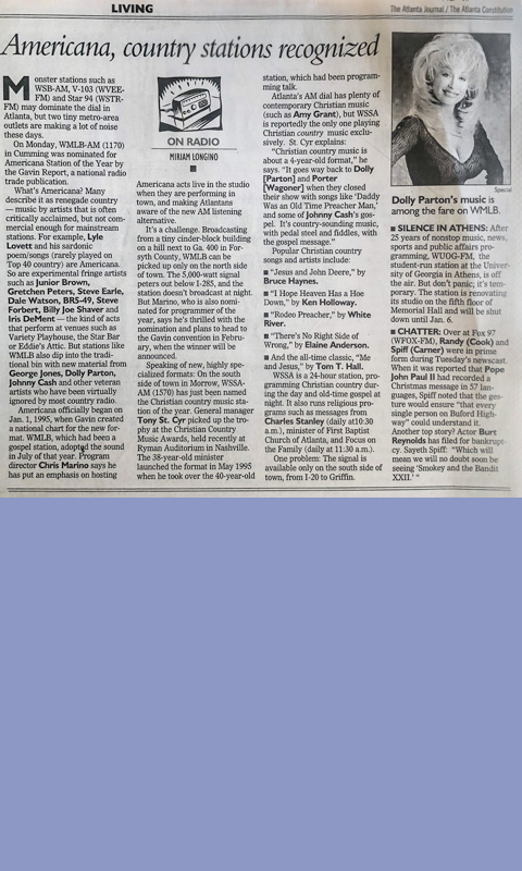 girl buried up to neck in the sand at beach